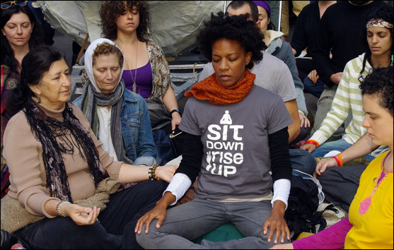 People sitting and meditating at Liberty Park on Sunday, October 16, Day 31 of Occupy Wall Street