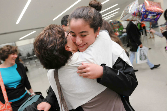 Charlotte Samuels hugs her grandmother (© Elizabeth Lara, North Jersey Media Group / The Record)