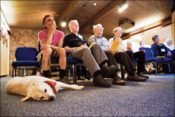 Three visitors, plus a service dog, attended worship one Sunday in June. (Rebecca Stumpf)