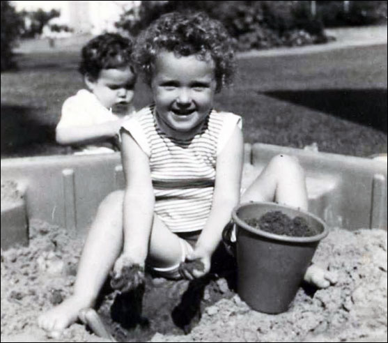 child in sandbox (cc 2006 Nicki Dugan Pogue)