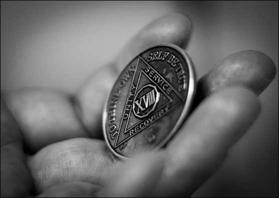 An Alcoholics Anonymous sobriety token.