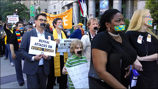 The Rev. Rob Hardies and the Rev. Cathy Rion Starr march in Raleigh, N.C., on May 19, 2014, during a Moral Monday demonstration.