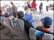 Peter Morales with migrants in Mexico (Dea Brayden)