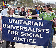 UUs with sign Unitarian Universalists for Social Justice