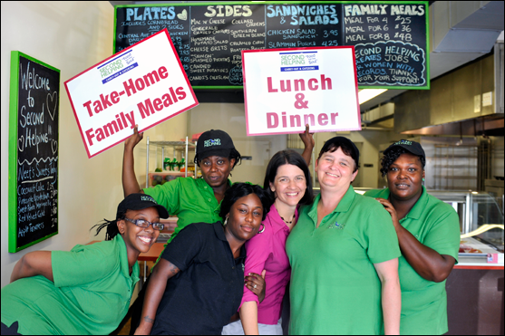 The Rev. Melissa Mummert (in pink) helped open the Second Helping café in Charlotte, N.C., which employs and trains formerly incarcerated women