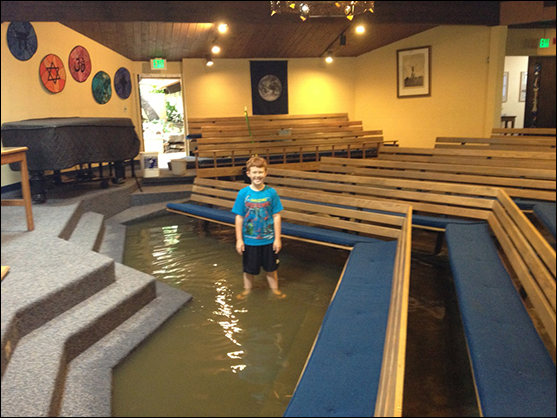 Fox Martin in flooded sanctuary of UU Church of Boulder