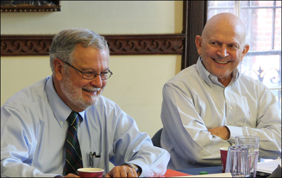 UUA President Peter Morales and Moderator Jim Key laughed during a presentation by the Rev. Harlan Limpert, chief operating officer, at the October 17–20 meeting of the UUA Board of Trustees in Boston