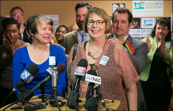 Lisa Chickadonz, left, and Chris Tanner, right, members of First Unitarian Church of Portland, were plaintiffs in the challenge to Oregon's marriage ban