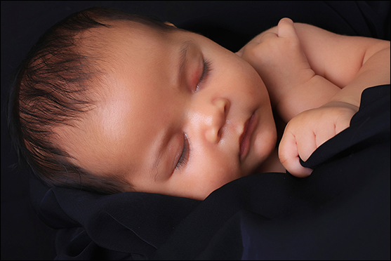 sleeping infant (iStockphoto.com/HannamariaH)