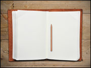 blank book with pencil